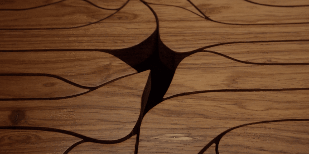 Close-up of the carved star detail on a handcrafted wooden drum